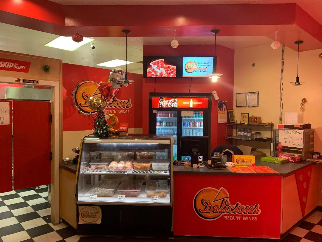 Delicious Pizza N Wings restaurant on McPhillips Street in north Winnipeg