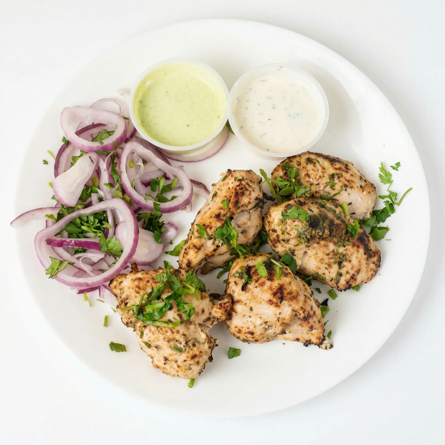 Chicken Malai Tikka at Delicious Pizza N Wings Winnipeg - creamy, mildly spiced boneless chicken