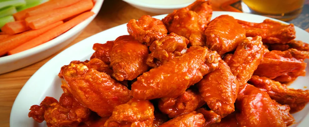 Specialty Wings at Delicious Pizza N Wings Winnipeg - Indian-inspired marinades